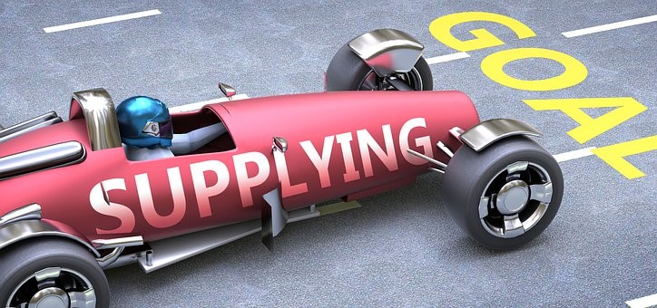 Race Car with  words on the side saying Supplying