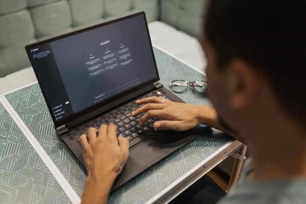 Man using computer with Chat GPT